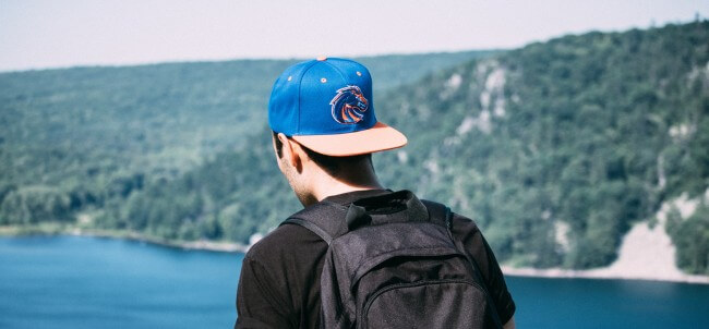 man wearing cap backwards