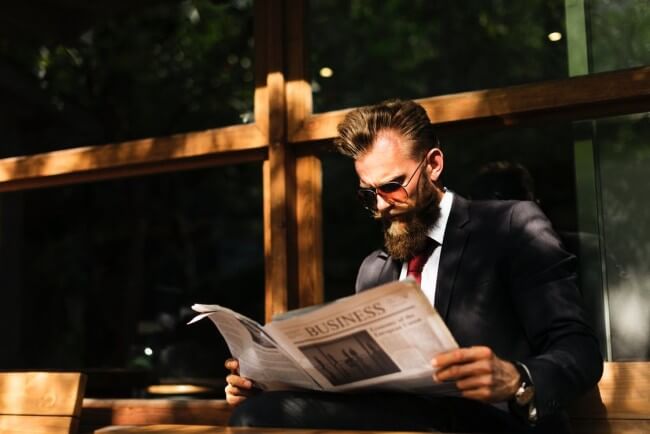 businessman reading news