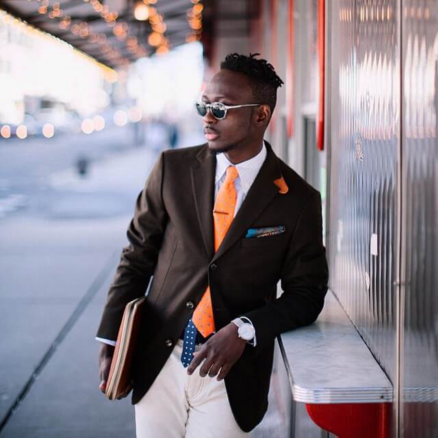 orange and burgundy ties and pocket squares