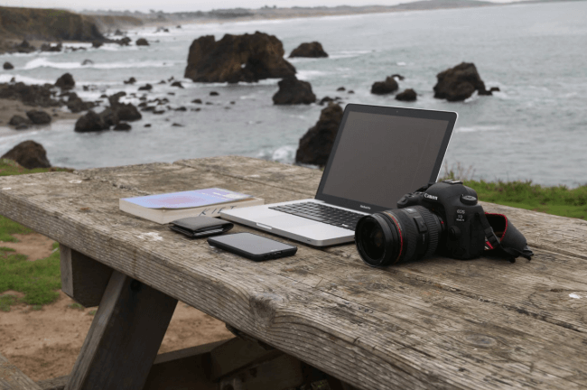 working outdoors with a sea view